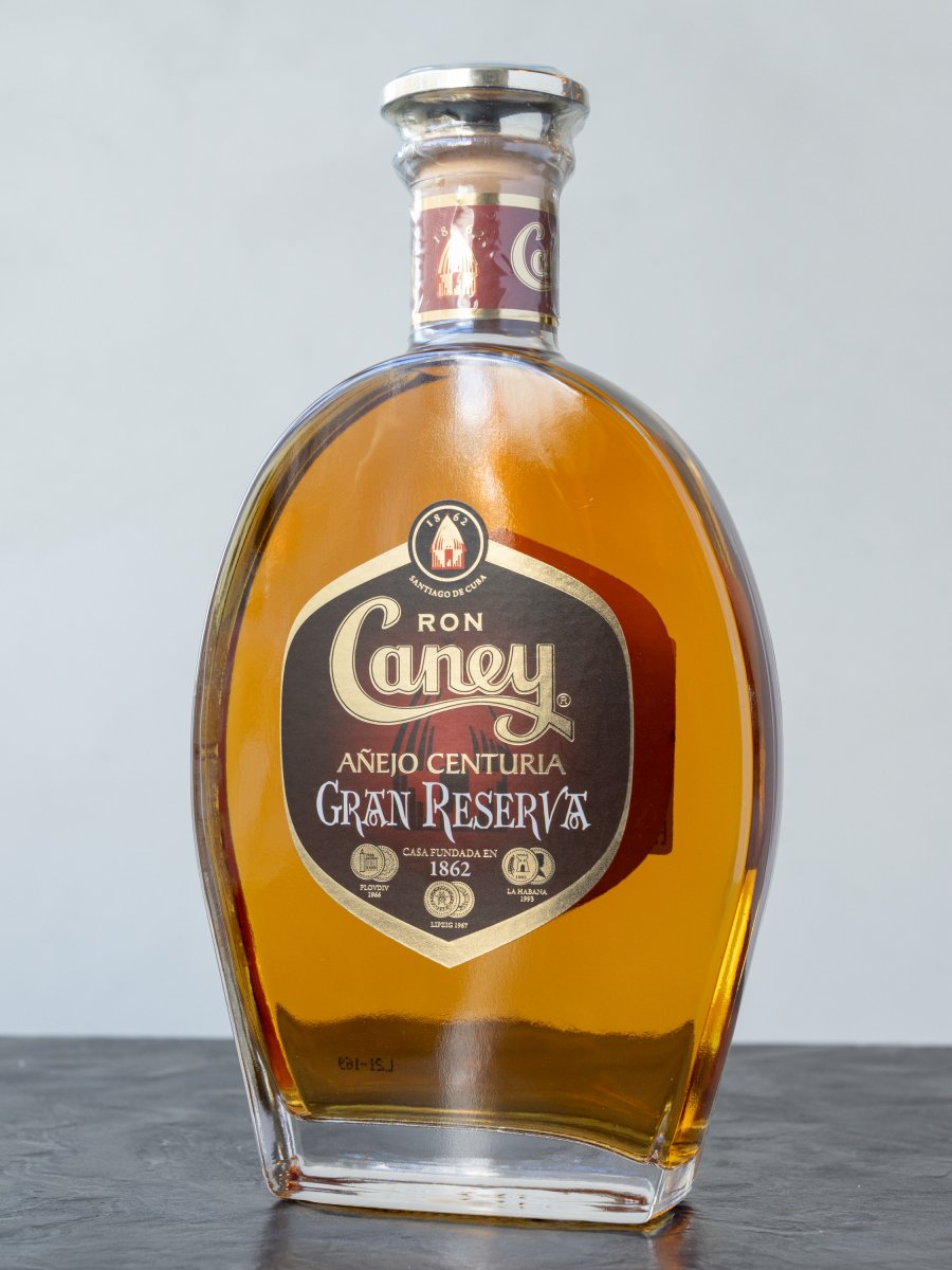 Ром Caney Anejo Centuria Gran Reserva купить в винном ресторане Остерия Амичи - лучшая цена
Ром Caney Anejo Centuria Gran Reserva / Каней Аньехо Сентурия Гран Ресерва 10 лет
