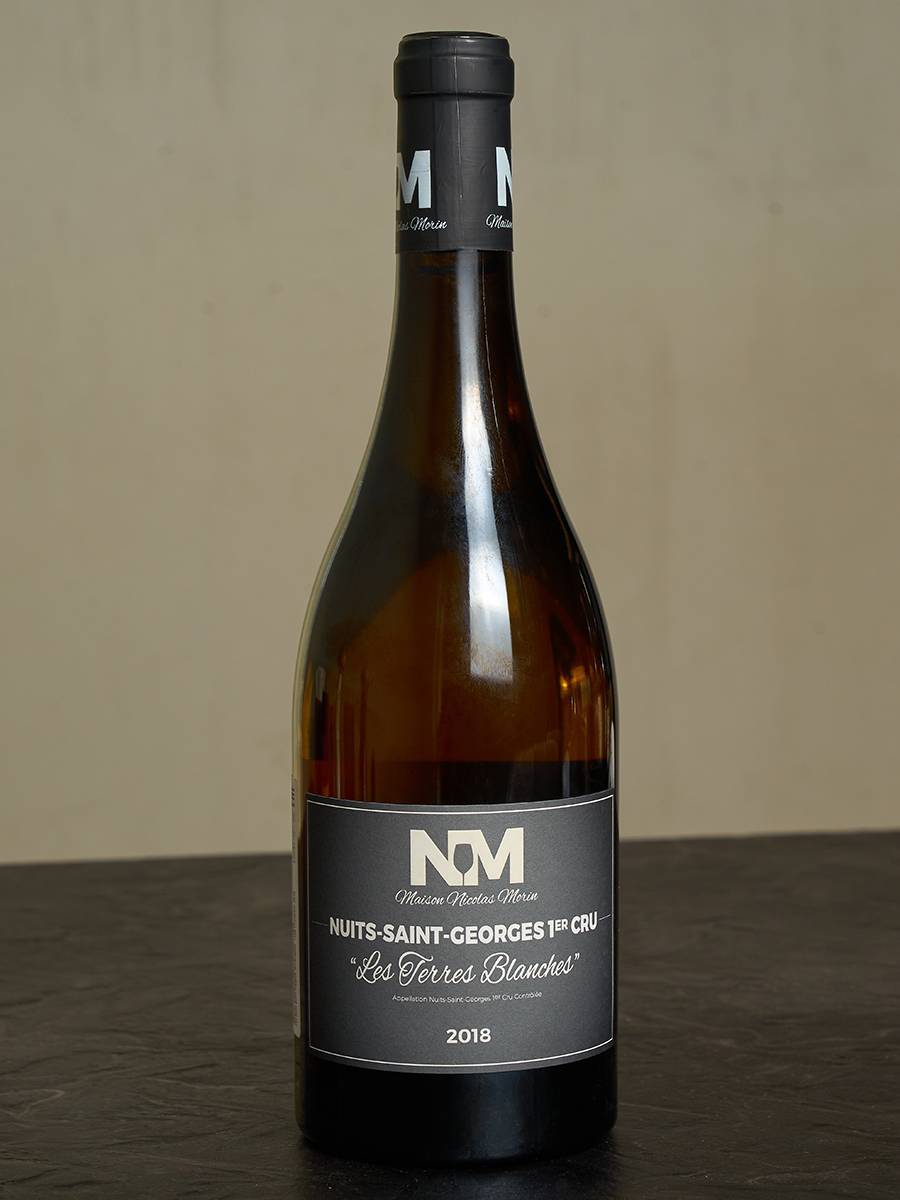 Вино Maison Nicolas Morin Nuits-Saint-Georges Premier Cru Les Terres Blanches 2018 купить в винном ресторане Остерия - лучшая цена Вино Maison Nicolas Morin Nuits-Saint-Georges Premier Cru Les Terres Blanches 2018 / Мезон Николя Моран Нюи Сен Жорж Премье Крю Ле Терр Бланш