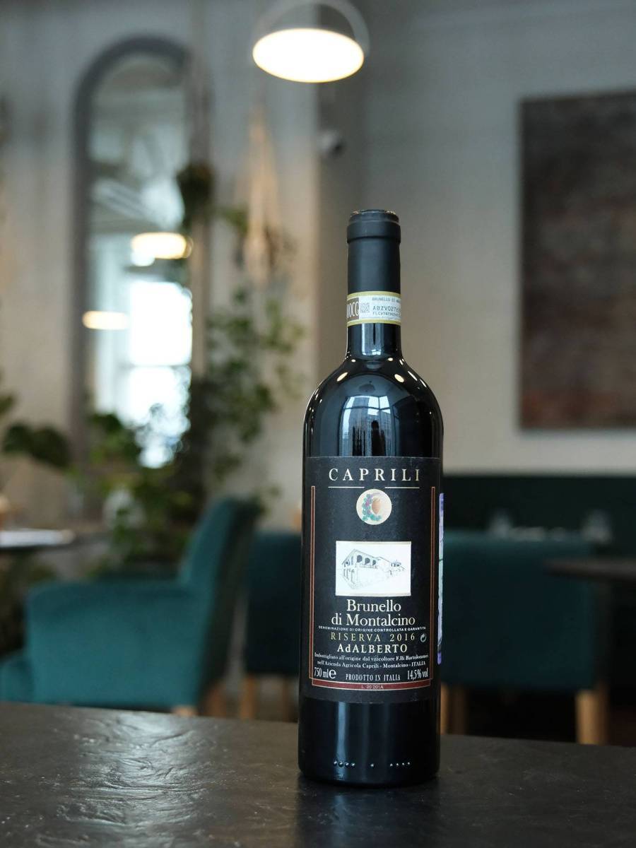 Вино Brunello di Montalcino AdAlberto Riserva Caprili 2016 купить в винном ресторане Остерия - лучшая цена Вино Brunello di Montalcino AdAlberto Riserva Caprili 2016 / Брунелло Ди Монтальчино Резерва АдАльберто Каприли 2016