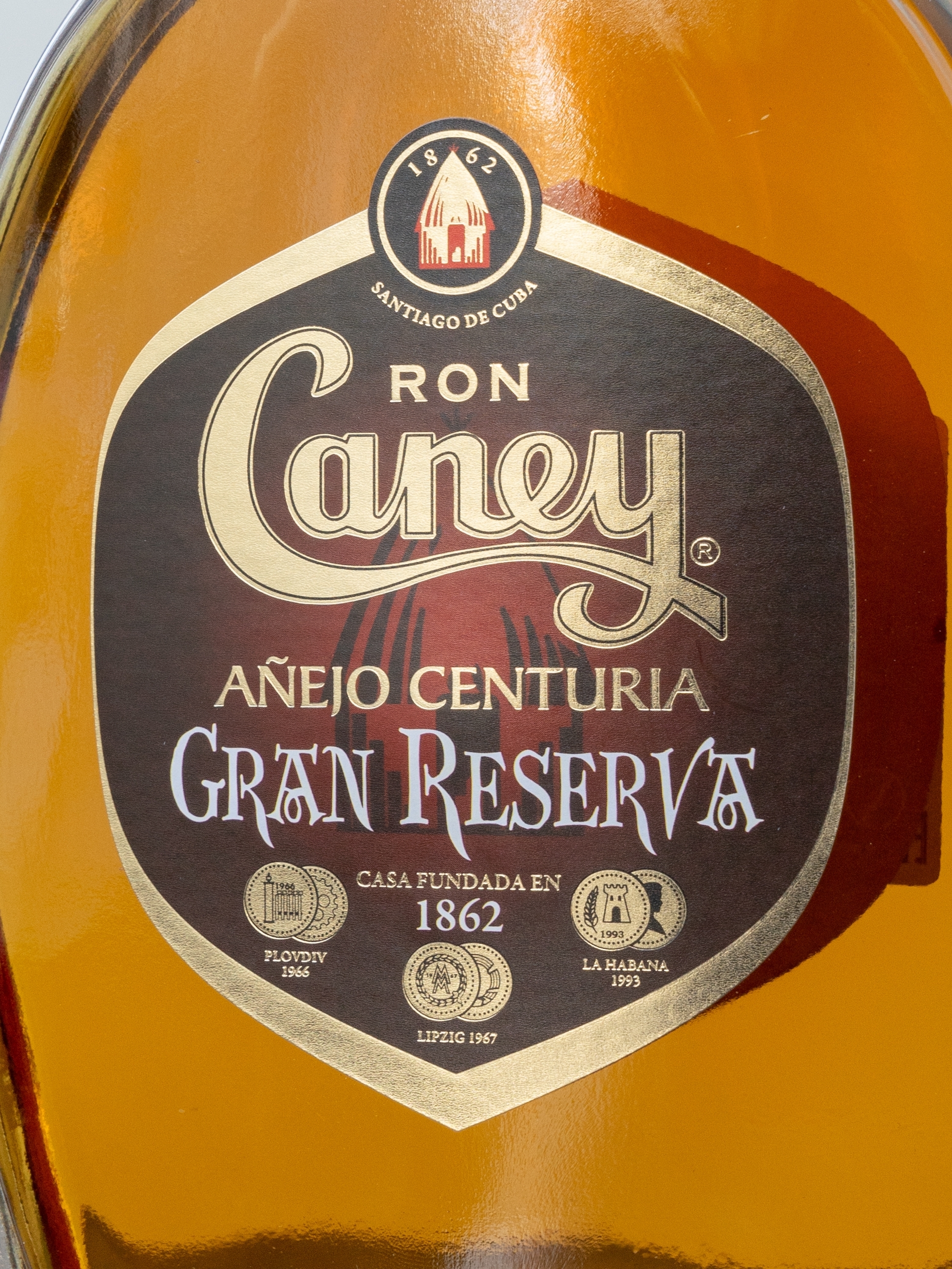 Ром Caney Anejo Centuria Gran Reserva купить в винном ресторане Остерия Амичи - лучшая цена
Ром Caney Anejo Centuria Gran Reserva / Каней Аньехо Сентурия Гран Ресерва 10 лет