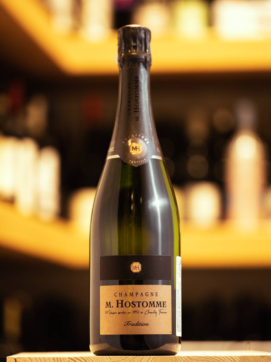 Шампанское M. Hostomme Cuvee Tradition Brut купить в винном ресторане Остерия - лучшая цена Шампанское M. Hostomme Cuvee Tradition Brut / М Остом Кюве Традисьон Брют