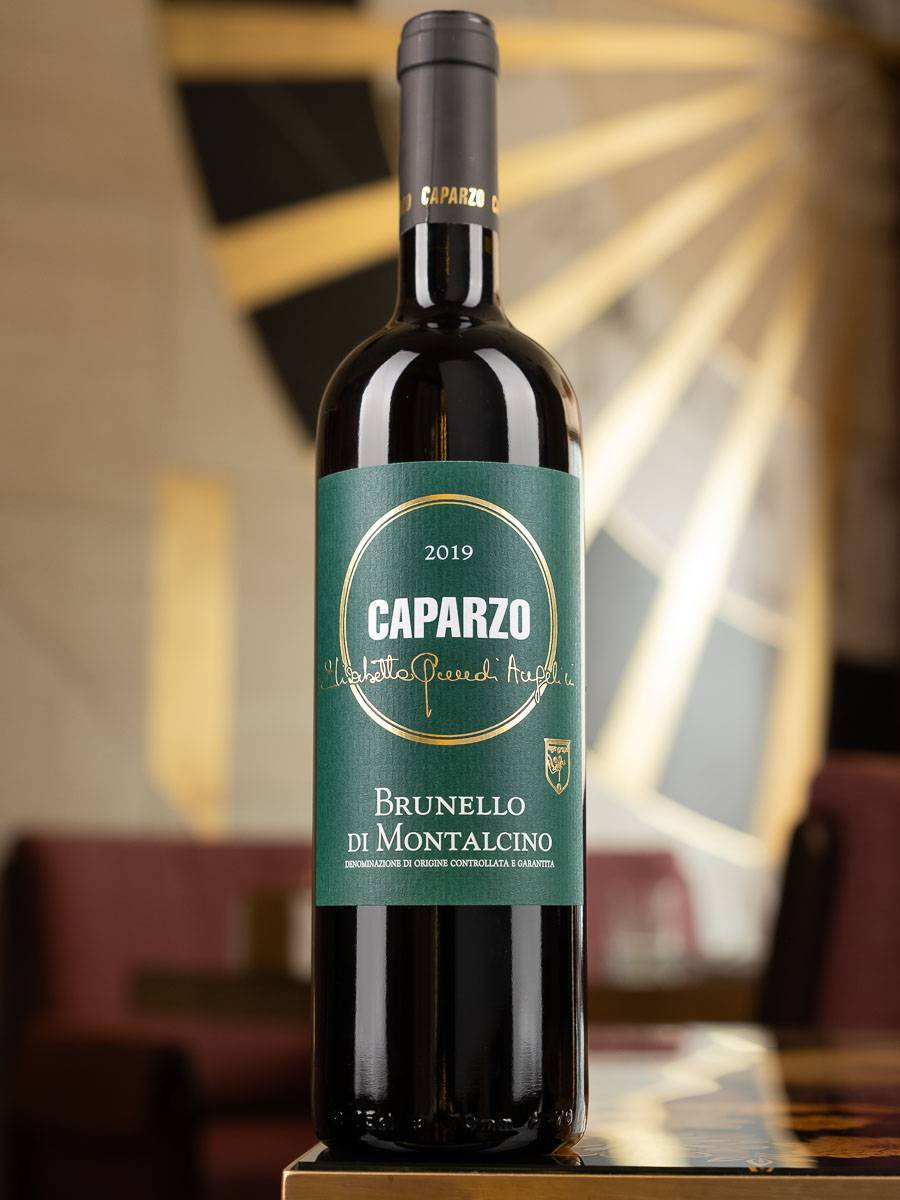 Купить вино Caparzo Brunello di Montalcino 2019 в винном ресторане Остерия - лучшая цена Вино Caparzo Brunello di Montalcino 2019 / Брунелло ди Монтальчино Капарцо
