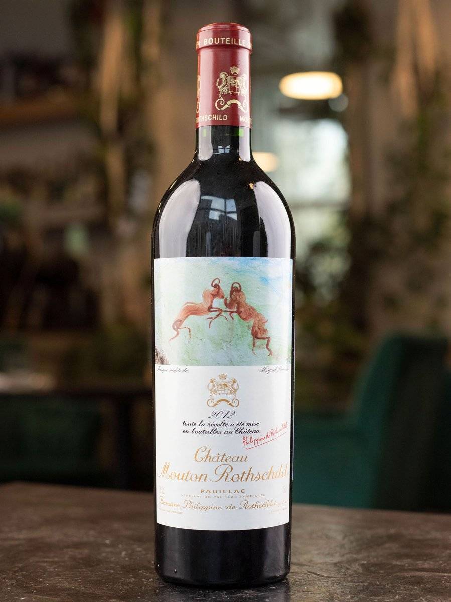 Вино Chateau Mouton Rothschild Pauillac Premier Grand Cru Classe 2012 купить в винном ресторане Остерия - лучшая цена Вино Chateau Mouton Rothschild Pauillac Premier Grand Cru Classe 2012 / Шато Мутон Ротшильд Пойяк Примьер Гранд Крю Классе