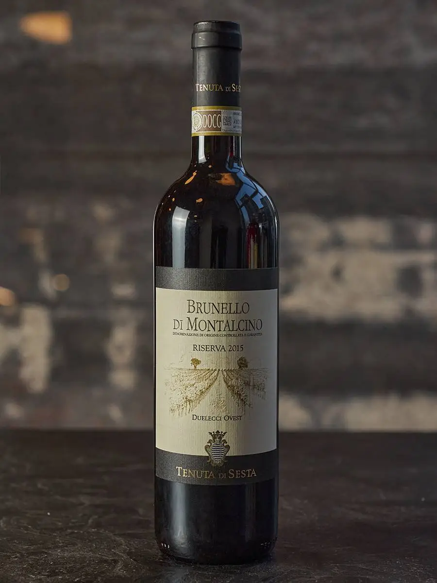 Вино Brunello di Montalchino Riserva Duelecci Ovest 2015 купить в винном ресторане Остерия - лучшая цена Вино Brunello di Montalchino Riserva Duelecci Ovest 2015 / Брунелло ди Монтальчино Ризерва Дуэлеччи Овест