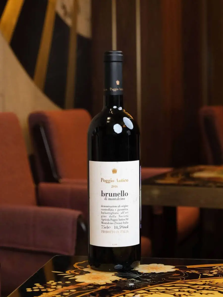 Вино Poggio Antico Brunello di Montalcino 2016 купить в винном ресторане Остерия - лучшая цена Вино Poggio Antico Brunello di Montalcino 2016 / Поджо Антико Брунелло ди Монтальчино