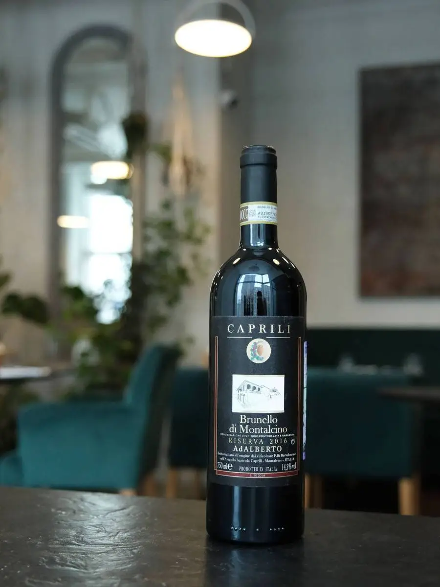Вино Brunello di Montalcino AdAlberto Riserva Caprili 2016 купить в винном ресторане Остерия - лучшая цена Вино Brunello di Montalcino AdAlberto Riserva Caprili 2016 / Брунелло Ди Монтальчино Резерва АдАльберто Каприли 2016
