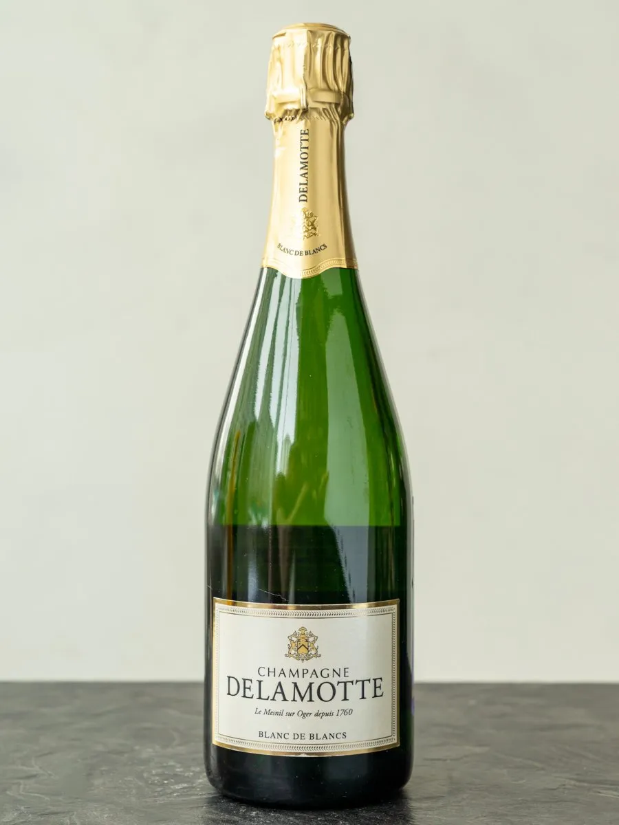 Шампанское Delamotte Brut Blanc de Blancs купить в винном ресторане Остерия - лучшая цена Шампанское Delamotte Brut Blanc de Blancs / Деламотт Шампань Блан де Блан