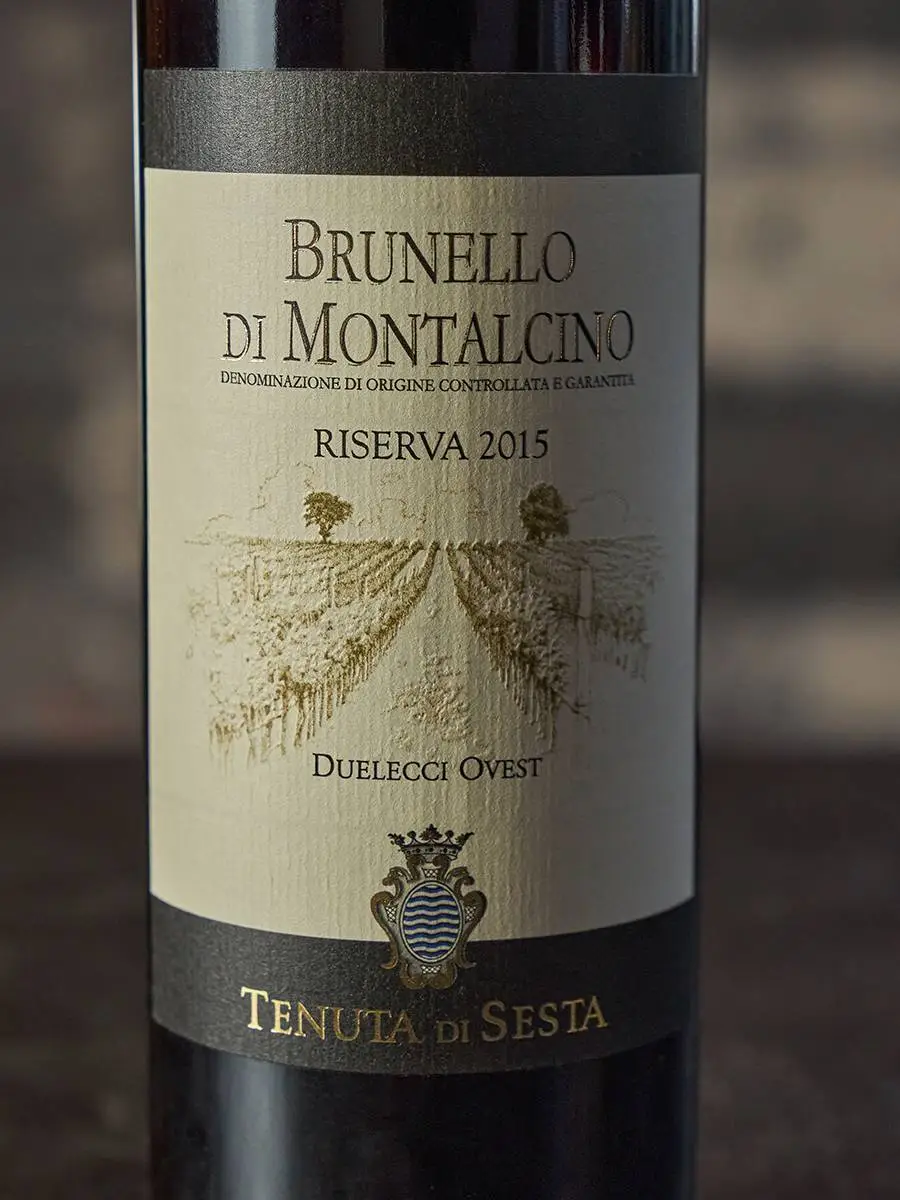 Вино Brunello di Montalchino Riserva Duelecci Ovest 2015 купить в винном ресторане Остерия - лучшая цена Вино Brunello di Montalchino Riserva Duelecci Ovest 2015 / Брунелло ди Монтальчино Ризерва Дуэлеччи Овест