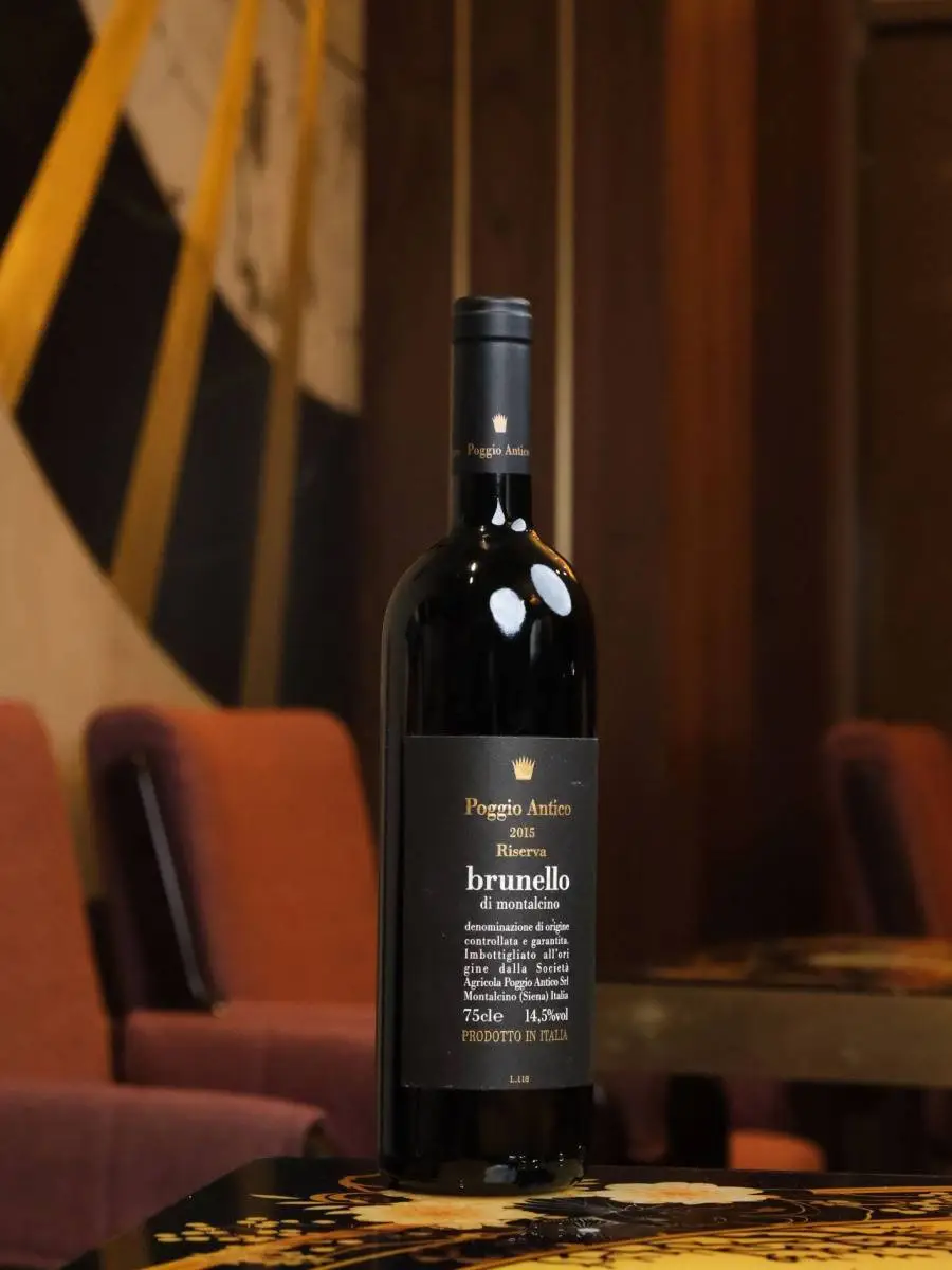 Вино Brunello di Montalcino Riserva Poggio Antico 2015 купить в винном ресторане Остерия - лучшая цена Вино Brunello di Montalcino Riserva Poggio Antico 2015 / Брунелло ди Монтальчино Резерва Подджо Антико