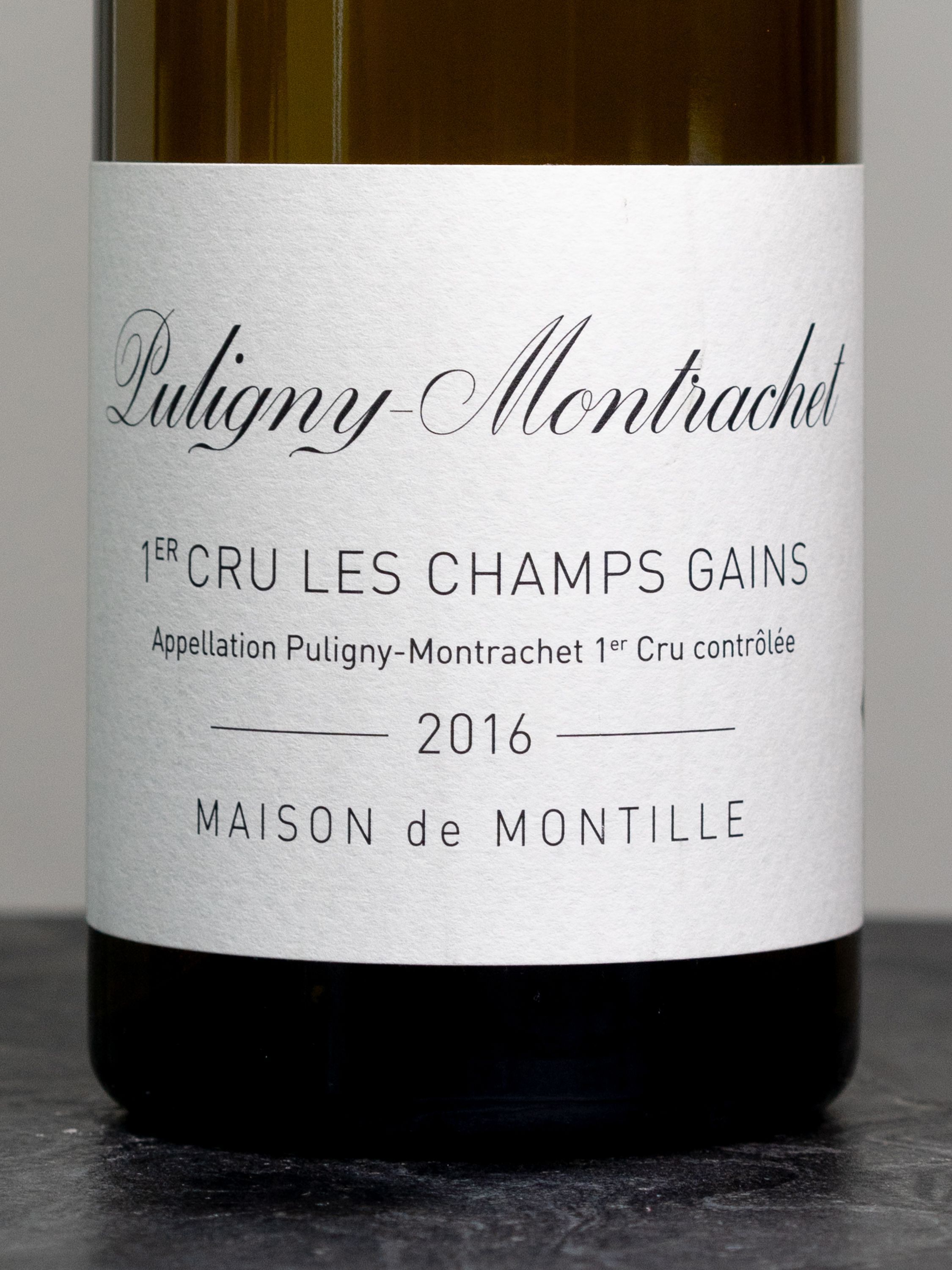 Купить вино Camille Giroud Puligny-Montrachet Premier Cru Les Champs Gain в винном ресторане Остерия цена Вино Maison de Montille Puligny-Montrachet Premier Cru Les Champs Gain / Мезон де Монтий Пюлиньи-Монраше Премье Крю Ле Шам Ген