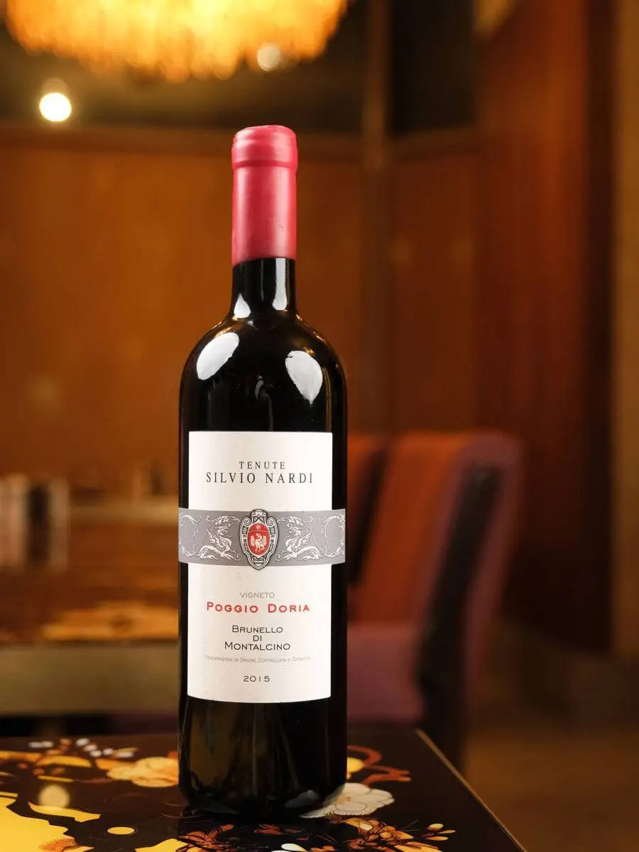 Вино Brunello di Montalcino Poggio Doria Tenute Silvio Nardi 2015 купить в винном ресторане Остерия - лучшая цена Вино Brunello di Montalcino Poggio Doria Tenute Silvio Nardi 2015 / Брунелло ди Монтальчино Винето Поджио Дория Тенуте Сильвио Нарди